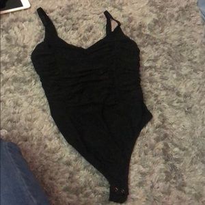 A black body suit